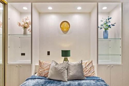 Ένα ή περισσότερα κρεβάτια σε δωμάτιο στο Entire Holiday Apartment