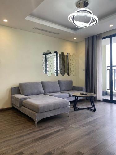 a living room with a couch and a table at Hi-Home - City view apartment in HongKong Tower in Hanoi