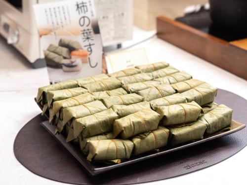 a tray of food sitting on a table at Super Hotel Premier JR Nara Eki in Nara