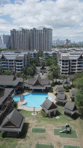 an aerial view of a swimming pool in a city at KAMALA 503 ACACIA ESTATE TAGUIG CITY in Manila