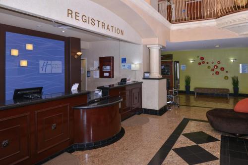 a waiting area of a hospital with a sign that reads restoration at Holiday Inn Express Hotel & Suites El Centro by IHG in El Centro