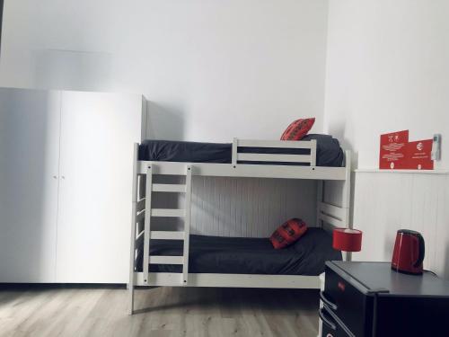 Una cama o camas cuchetas en una habitación  de Andino BnB