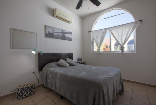 Ένα ή περισσότερα κρεβάτια σε δωμάτιο στο Casa Sol Nice & warm 1BR apartment in historic center