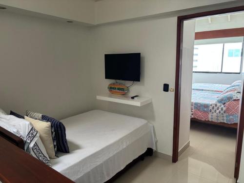 Hansa Reef - Espectacular Penthouse en San Andrésにあるベッド