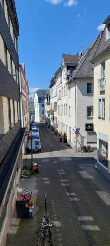 a bike parked on the side of a street at Rheingold inklusive einer Flasche Sekt in Koblenz