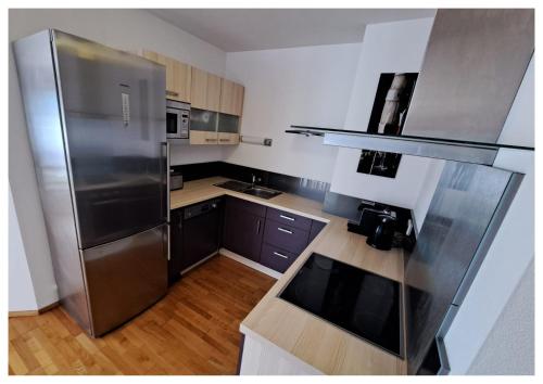 Kuchyň nebo kuchyňský kout v ubytování Laerchenlodge