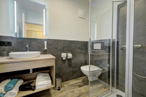 Ένα μπάνιο στο Hotel-Restaurant Bike&Snow Lederer
