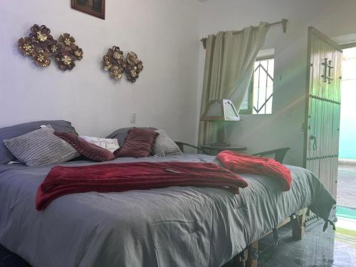 Postel nebo postele na pokoji v ubytování La Casa de los Abuelos