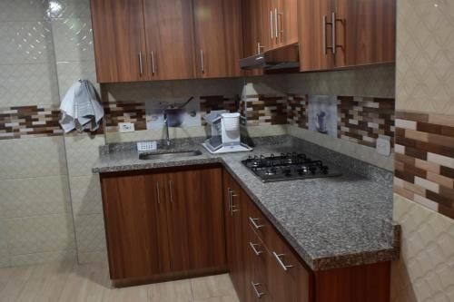 Kuchyň nebo kuchyňský kout v ubytování Paiparadise 302