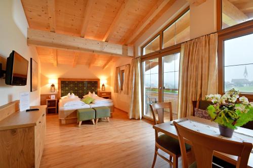 Voodi või voodid majutusasutuse Hotel Garni Bavaria toas