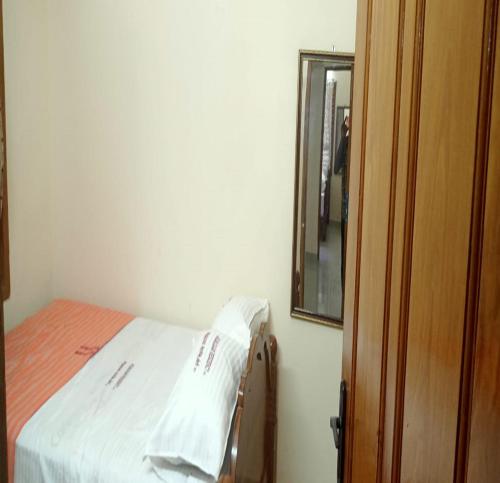 Cama o camas de una habitación en Arumugam Residency AC