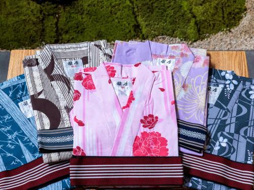 a group of ties sitting on top of a table at Giappo Franca Kyoto in Kyoto