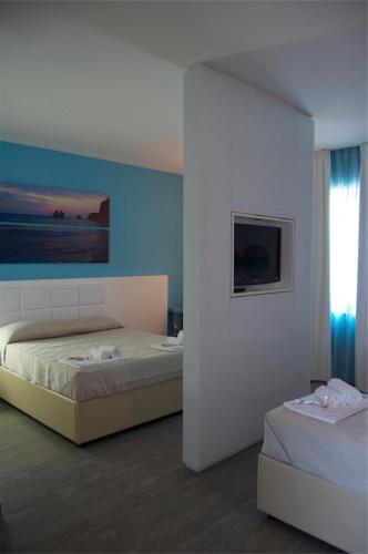 Ένα ή περισσότερα κρεβάτια σε δωμάτιο στο Motel S.16