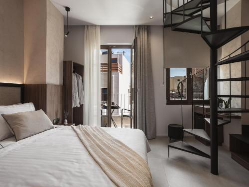 a bedroom with a loft bed and a balcony at Copal Simple Staying in Chania