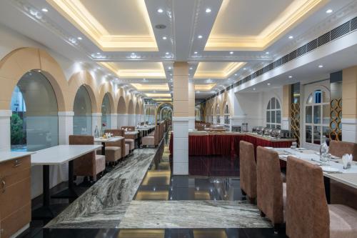 Restoran või mõni muu söögikoht majutusasutuses Hyde Park Orchards
