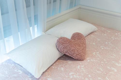 Cama ou camas em um quarto em Smile Apartments