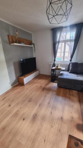 Postel nebo postele na pokoji v ubytování Ferienhaus Bühlertal mit 3 Fewos