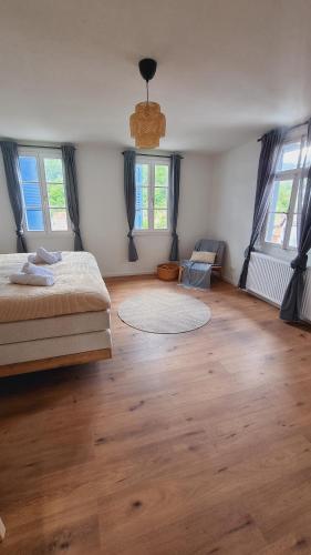 Postel nebo postele na pokoji v ubytování Ferienhaus Bühlertal mit 3 Fewos