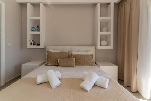 Ένα ή περισσότερα κρεβάτια σε δωμάτιο στο SkyBlue Horizon Studio 4