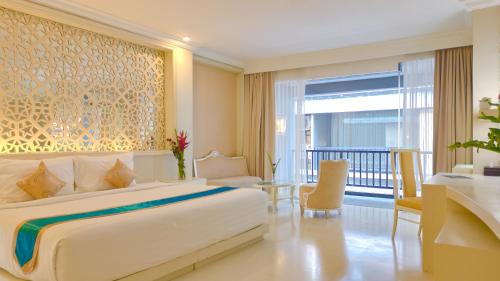 Ένα ή περισσότερα κρεβάτια σε δωμάτιο στο Ululani Bali