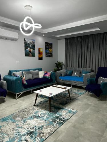 Χώρος καθιστικού στο Twin House 4Bedrooms in mountain view Ras Elhkima