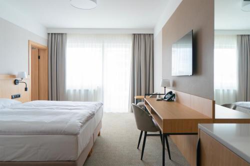 Postel nebo postele na pokoji v ubytování Hotel Continental