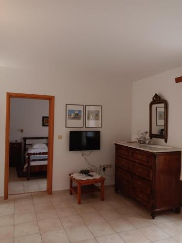 TV o dispositivi per l'intrattenimento presso Guest House Lucijo