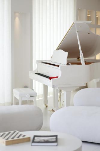 Postel nebo postele na pokoji v ubytování Pagoda Lifestyle Hotel