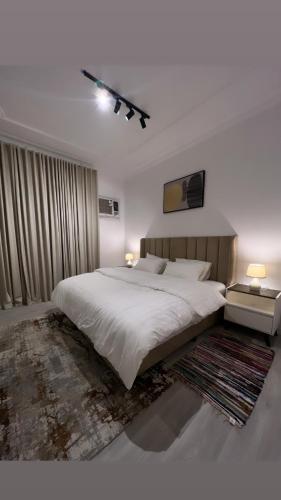 Katil atau katil-katil dalam bilik di شقة فندقية تصميم مودرن