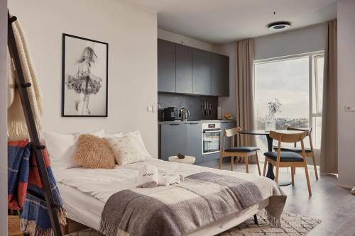 Postel nebo postele na pokoji v ubytování NORR, Mount view apartment, Center Reykjavik