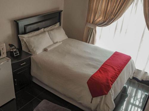 Katil atau katil-katil dalam bilik di Mesda Bed & Breakfast