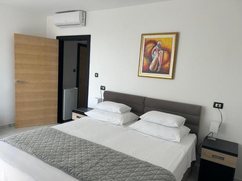 Ένα ή περισσότερα κρεβάτια σε δωμάτιο στο VILLA JANE INN