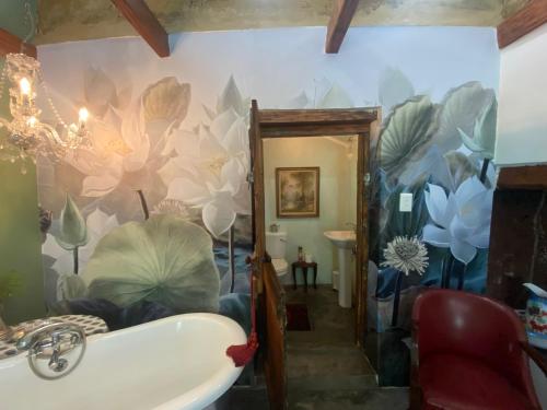 Un lugar para sentarse en The Riverdeck Accommodation and Backpackers