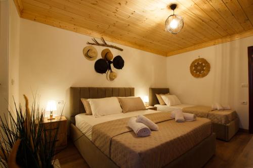 Postel nebo postele na pokoji v ubytování Guva Guest House
