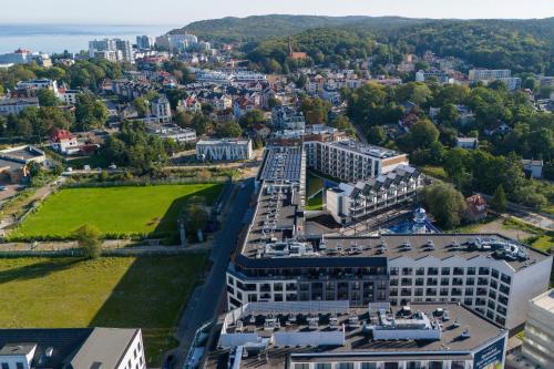 an aerial view of a city with buildings at Sun & Beach Apartments Bel Mare with Parking by Noclegi Renters in Międzyzdroje