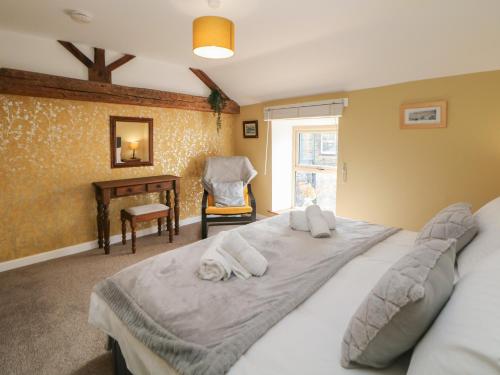Postel nebo postele na pokoji v ubytování The Cottage Bradwell