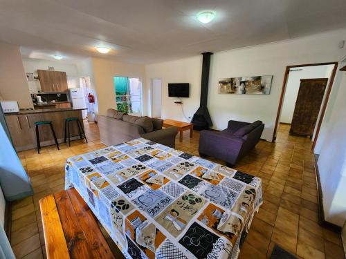 an aerial view of a living room with a bed at Pine Valley in Lanseria