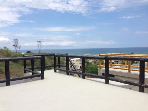 a view of the ocean from the balcony of a house at The Heights in Montañita in Montañita