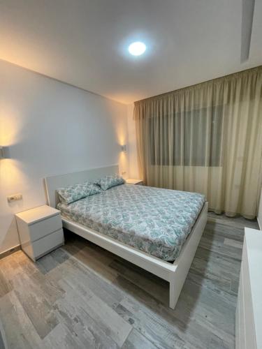 Ein Bett oder Betten in einem Zimmer der Unterkunft Résidence SARY'S-اقامة ساريس