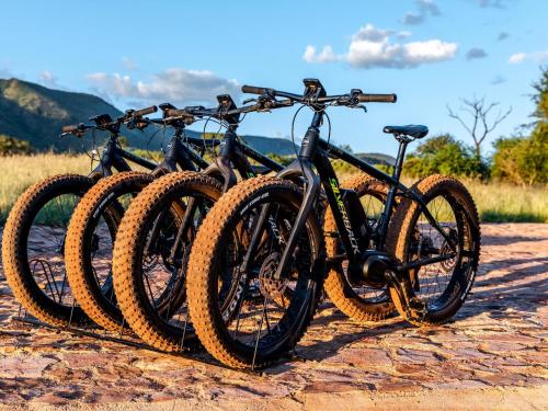 a group of bikes parked on a dirt road at Thaba eNtle Private Boutique Game Farm in Thabazimbi