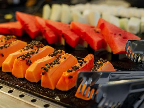 a bunch of different types of food on a table at ibis Styles Goiânia Shopping Estação in Goiânia