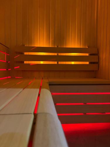 an empty bench with red lights on it at voco Reading in Reading