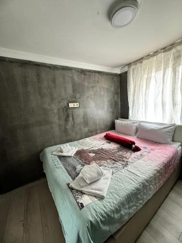 Ένα ή περισσότερα κρεβάτια σε δωμάτιο στο Happy Suite Boutique Hotel