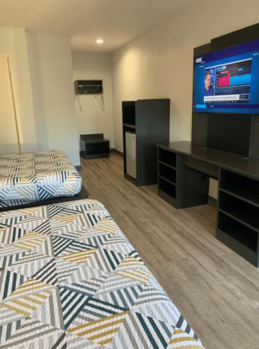 Un ou plusieurs lits dans un hébergement de l'établissement Motel 6 San Diego, CA Airport Harbor