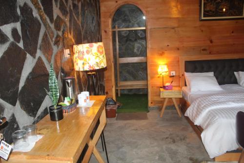 Postel nebo postele na pokoji v ubytování Ridge Inn