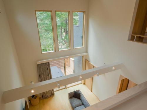 an image of a staircase in a house at Rakuten STAY VILLA Kinugawa Riverside in Nikko