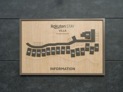 a sign on a wall with a map of a building at Rakuten STAY VILLA Kinugawa Riverside in Nikko
