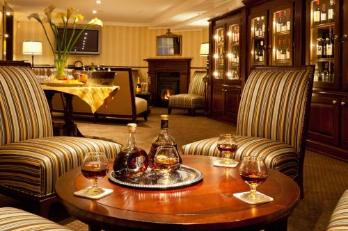 Nápoje v ubytování Crowne Pointe Historic Inn Adults Only