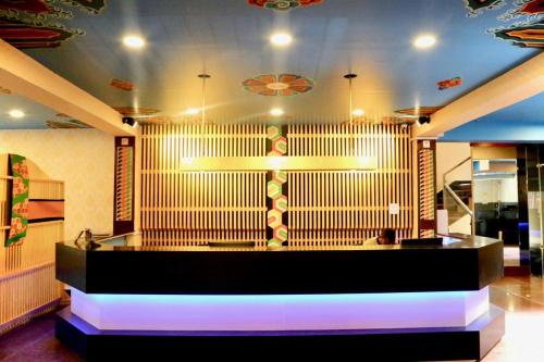 Ένα ή περισσότερα κρεβάτια σε δωμάτιο στο Kamalashi Boutique Inn