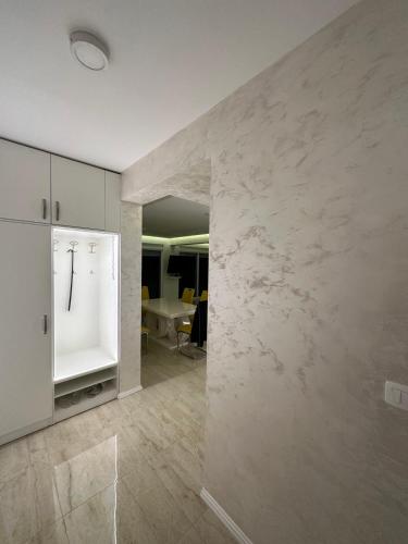 Η κουζίνα ή μικρή κουζίνα στο Deluxe Apartments 3-rooms